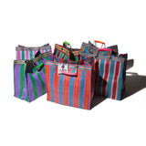 In stock March 2:  RECYCLED PLASTIC STRIPE BAG : Green x Red (Square)